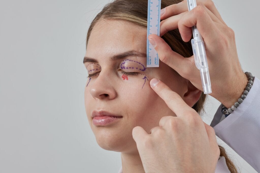 plastic-surgeon-prepares-blepharoplasty-blepharoplasty-operation-min