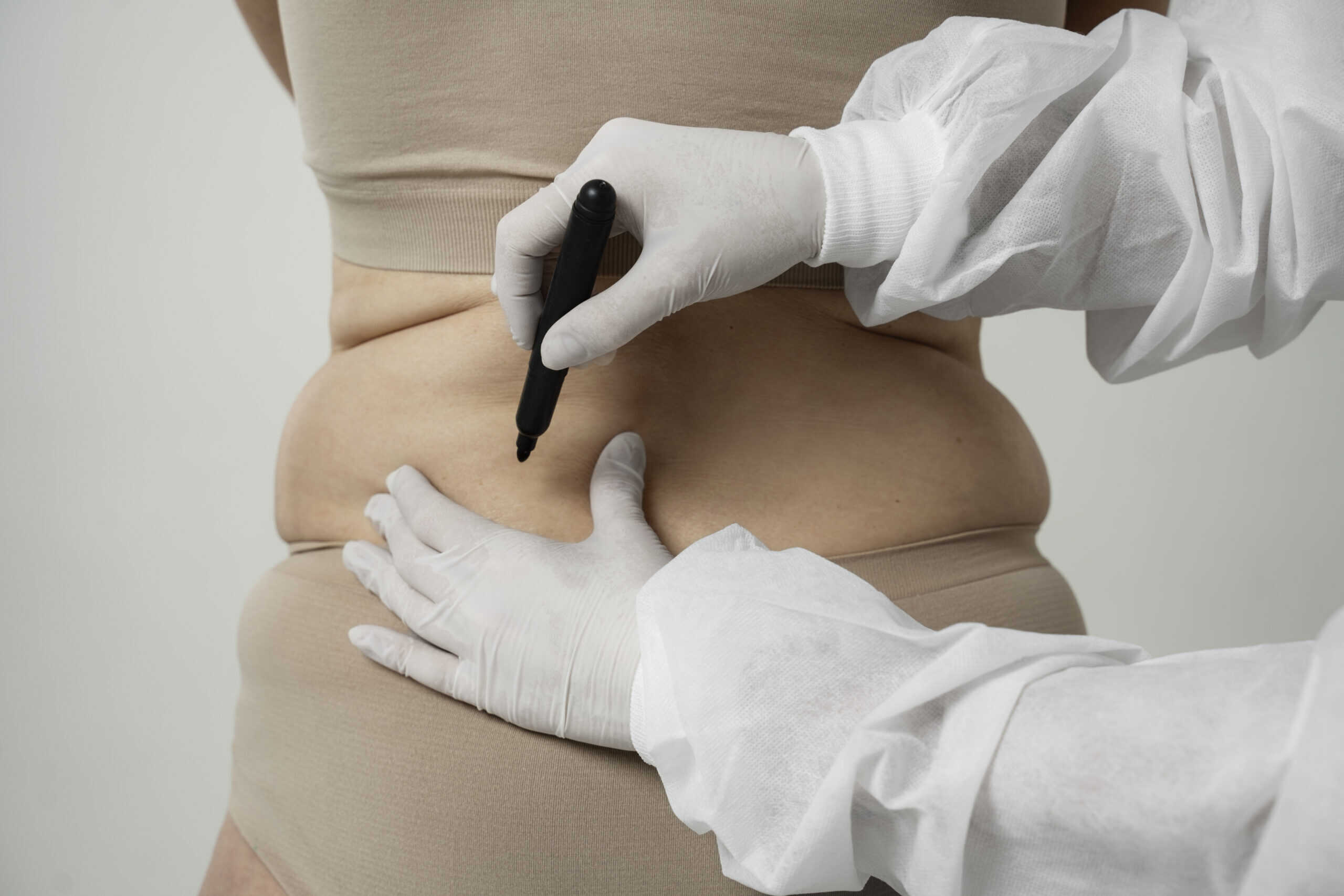 back-view-hands-with-gloves-drawing-with-marker